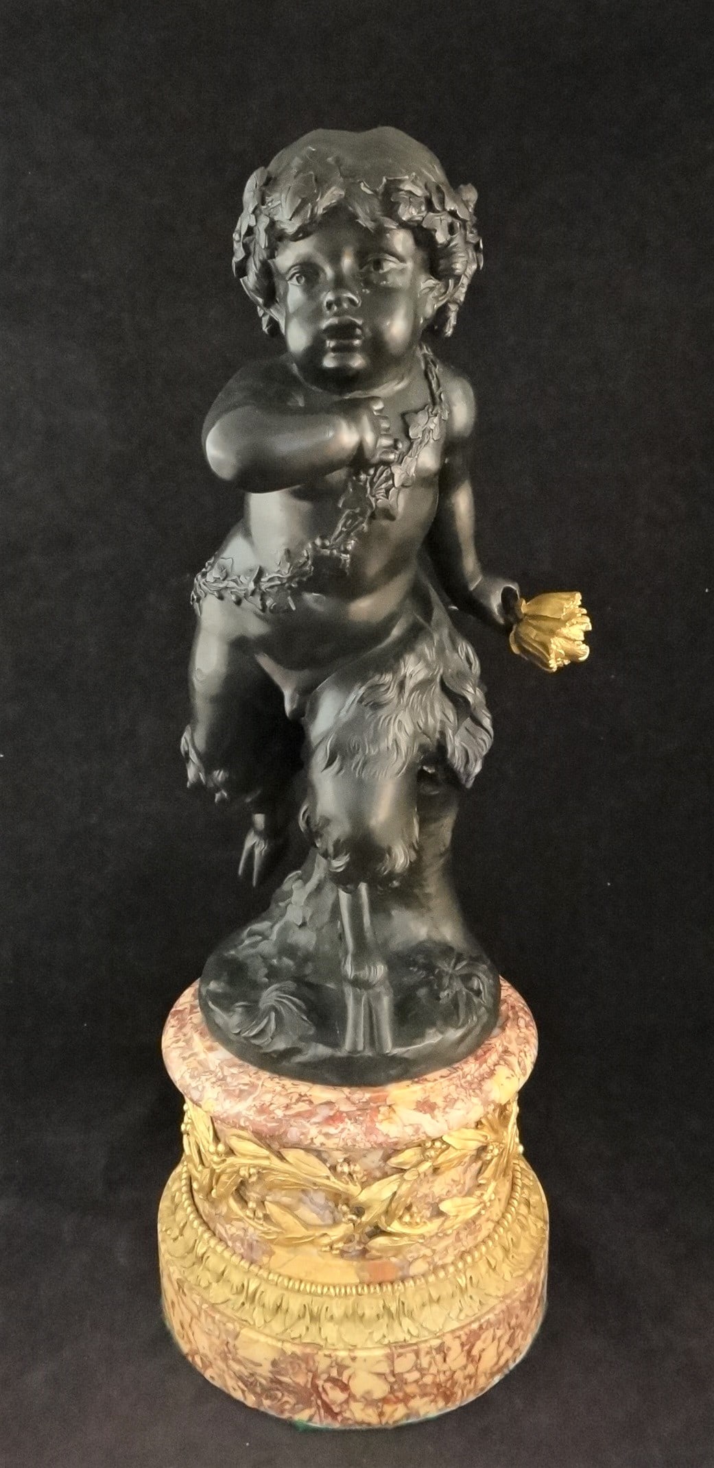 Antique French Louis XV Bronze - Infant Bacchus Satyr w/24k Gilt Flower. 16”: Very Fine & Large Antique French Louis XV Deep Brown Patina Bronze of an Infant Bacchus Satyr with Hoofed Feet Holding a 24k Gilt Bronze Flower. On a variegated marble plinth with finely case gilt bro