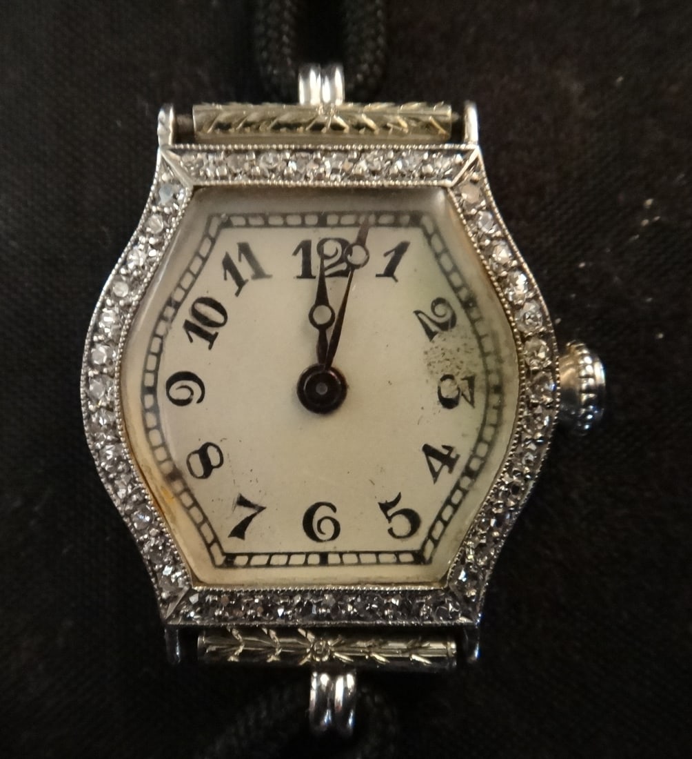 Vintage Cresarrow Platinum 18 Jewel Diamond Watch: Vintage Cresarrow Platinum 18 Jewel Diamond Watch, 14k White Gold & Black Cord Band. Measures approx. 19.7mm x 21.7mm. 5” wrist size, monogramed on back.