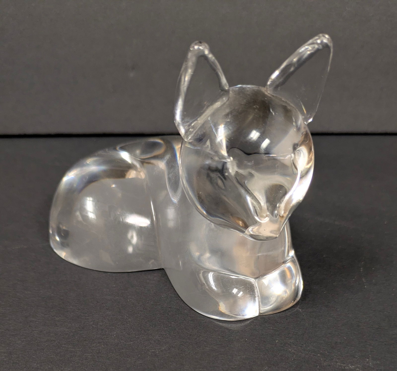 1950’s Steuben Crystal resting Kitten designed by Lloyd Atkins.: 1950’s Steuben Crystal resting Kitten designed by Lloyd Atkins. 4 ¼” long x 2 ¾” wide x 3” tall. Signed.