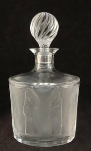 1960's Lalique Crystal Decanter, Femmes w/8 Roman style Goddesses.: 1960's Lalique Crystal Decanter, Femmes, 8 Roman style Goddesses around the oval decanter with frosted center & swirl design stopper. Goddesses are intaglio recessed. 9 1/2" tall x 5 1/2" wide x 4" de