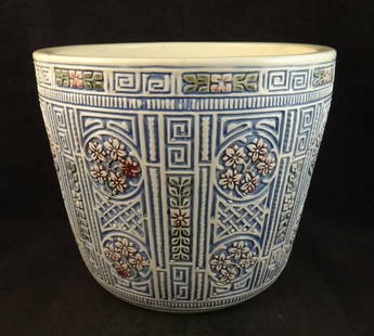 Weller Pottery Jardiniere in Pastel Blues, Greens & Pinks: Weller Pottery Jardiniere in Pastel Blues, Greens & Pinks with beautifully engraved cream colored background. Circa 1920’s. Measures 7 &frac34;&rdquo; t. 9 &frac12;&rdquo; dia.