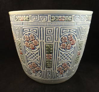 Weller Pottery Jardiniere in Pastel Blues, Greens & Pinks: Weller Pottery Jardiniere in Pastel Blues, Greens & Pinks with beautifully engraved cream colored background. Circa 1920’s. Measures 8 &frac34;&rdquo; t. 10 &frac12;&rdquo; dia.