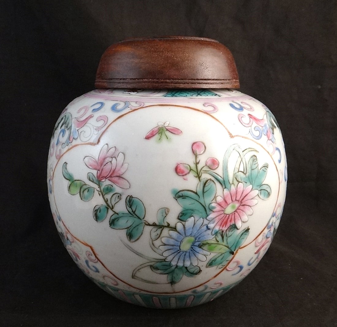 Antique Chinese Porcelain Vase w/floral & wood lid.: Antique Chinese Porcelain Vase with finely painted floral designs & old pierced wood lid. Qing Dynasty – 1800’s. 5 3/8” tall, 4 ¾” dia.