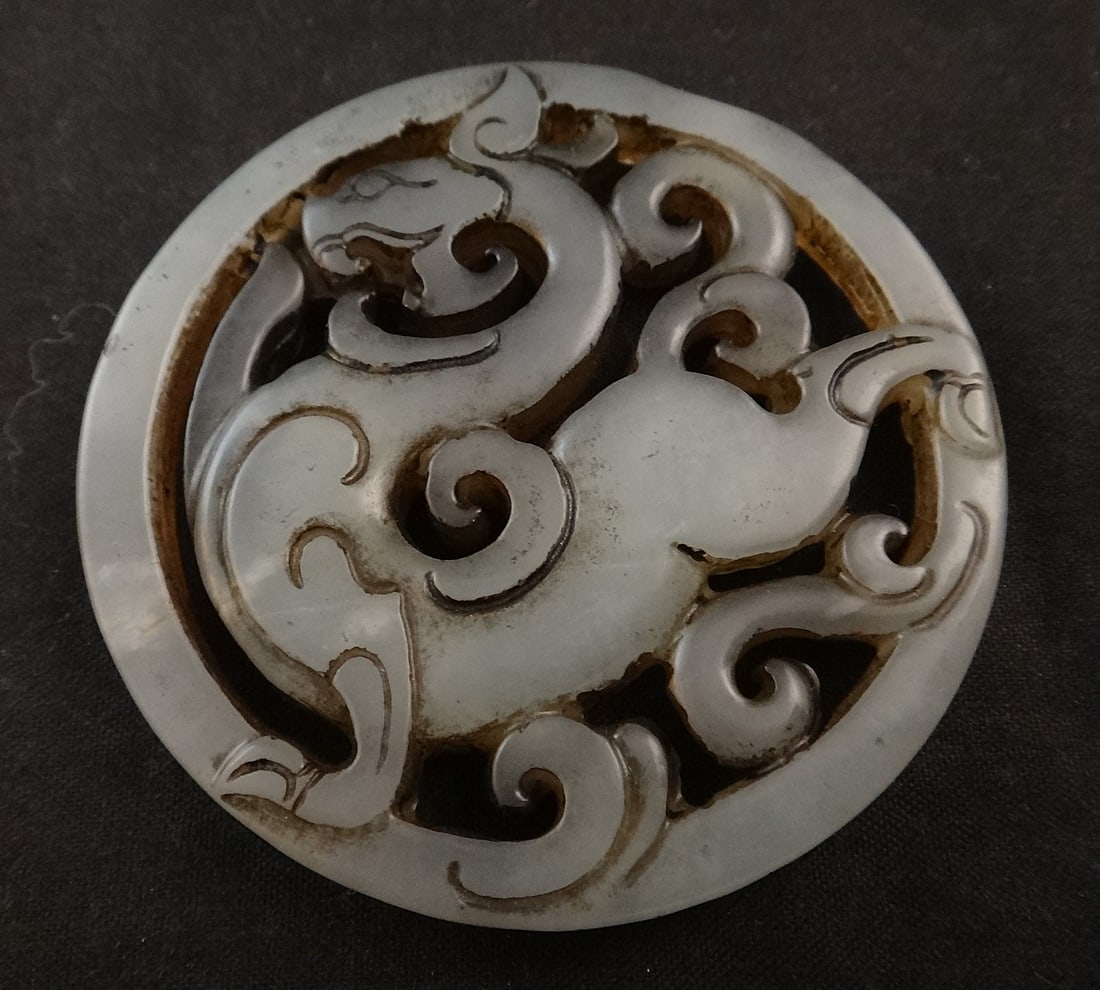 Antique Chinese Carved Jade PI -Mythical Creature Pendant.: Antique Chinese Carved Jade PI -Mythical Creature Pendant. 2 3/16” dia. 3/16” thick.