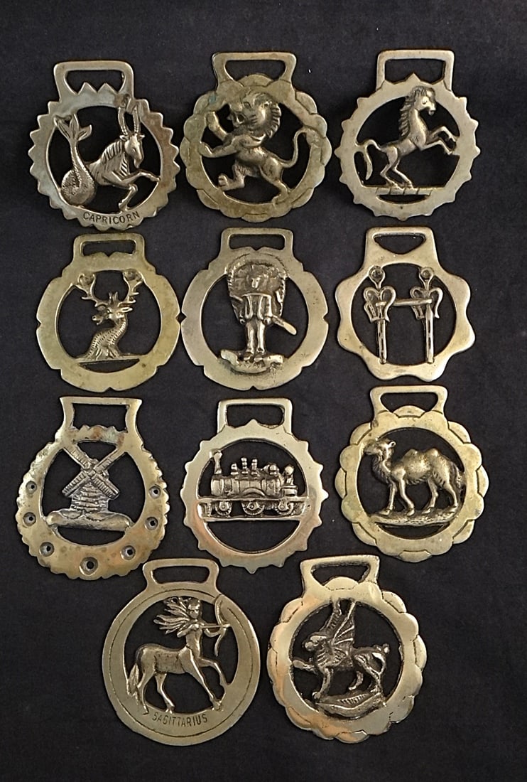 Collection of 11 Old English Solid Brass Horse Brasses: Collection of 11 Old English Solid Brass Horse Brasses in Various Patterns. No repeats. Measure between 2 5/8”-2 7/8 wide, most at 2 ¾” wide. 20th cent.