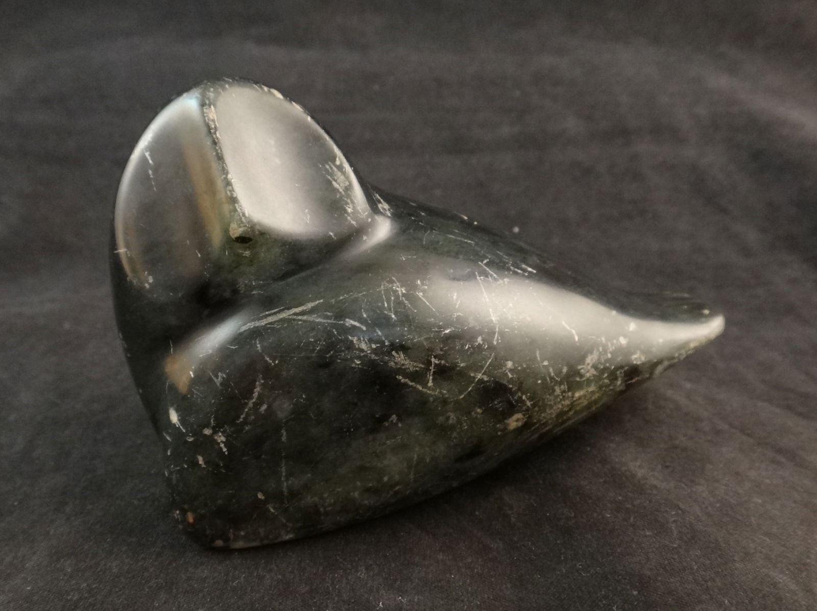 20th c. Inuit Eskimo Jade Carving of a Seated Owl: 20th c. Inuit Eskimo Jade Carving of a Seated Owl. Signed & dated 1983 on the bottom. Measures 3 ¾” wide x 2 3/8” tall x 2” deep. Jade was tested.