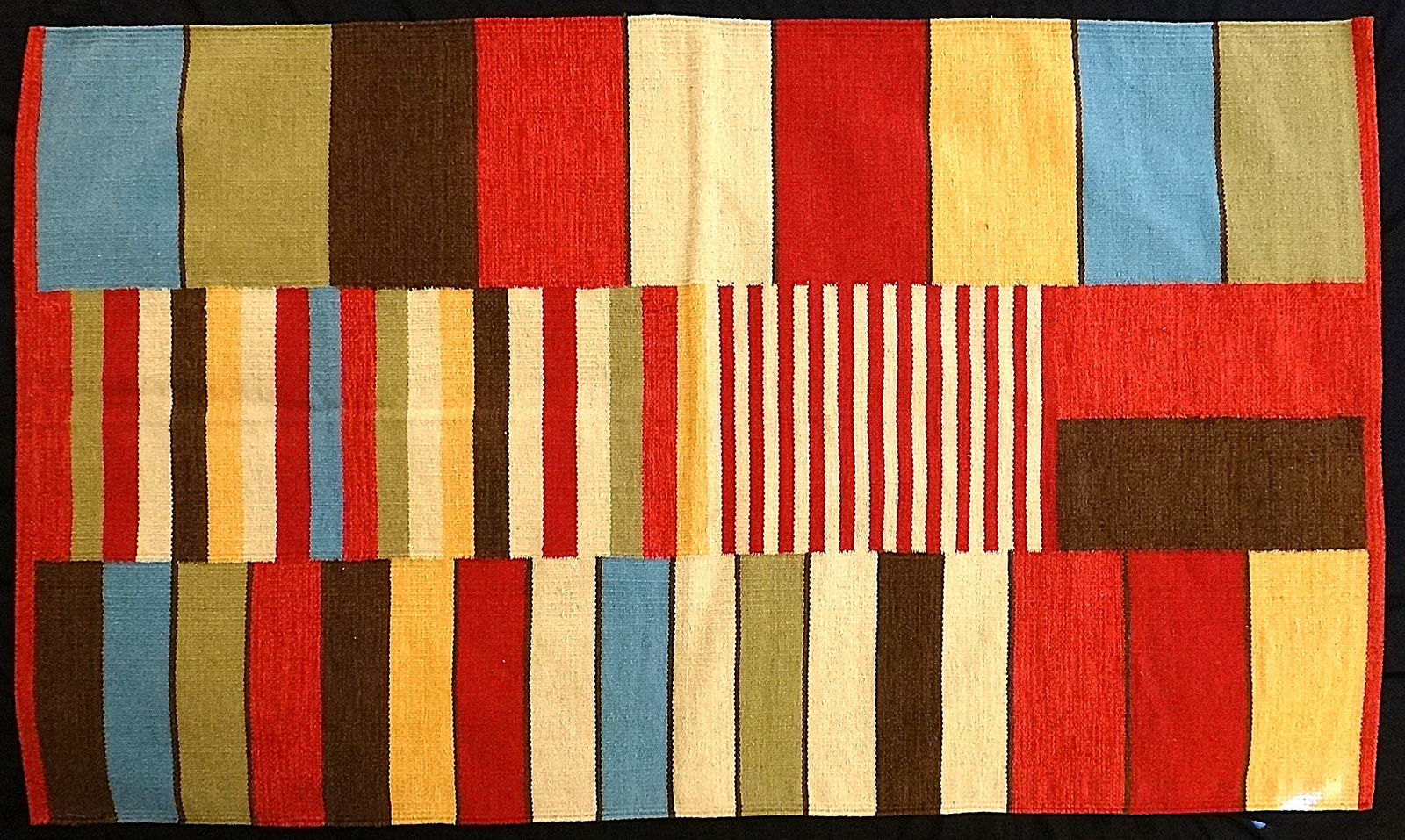 Lg. Vintage North American Indian Hand loomed Sheep Wool Rug: Large Vintage North American Indian Hand loomed Sheep Wool Rug with Brick red, Greens, Blues, Natural & Yellow Bands. Measures 96.5” x 61.5”. Photo 1 is a left & right combined.