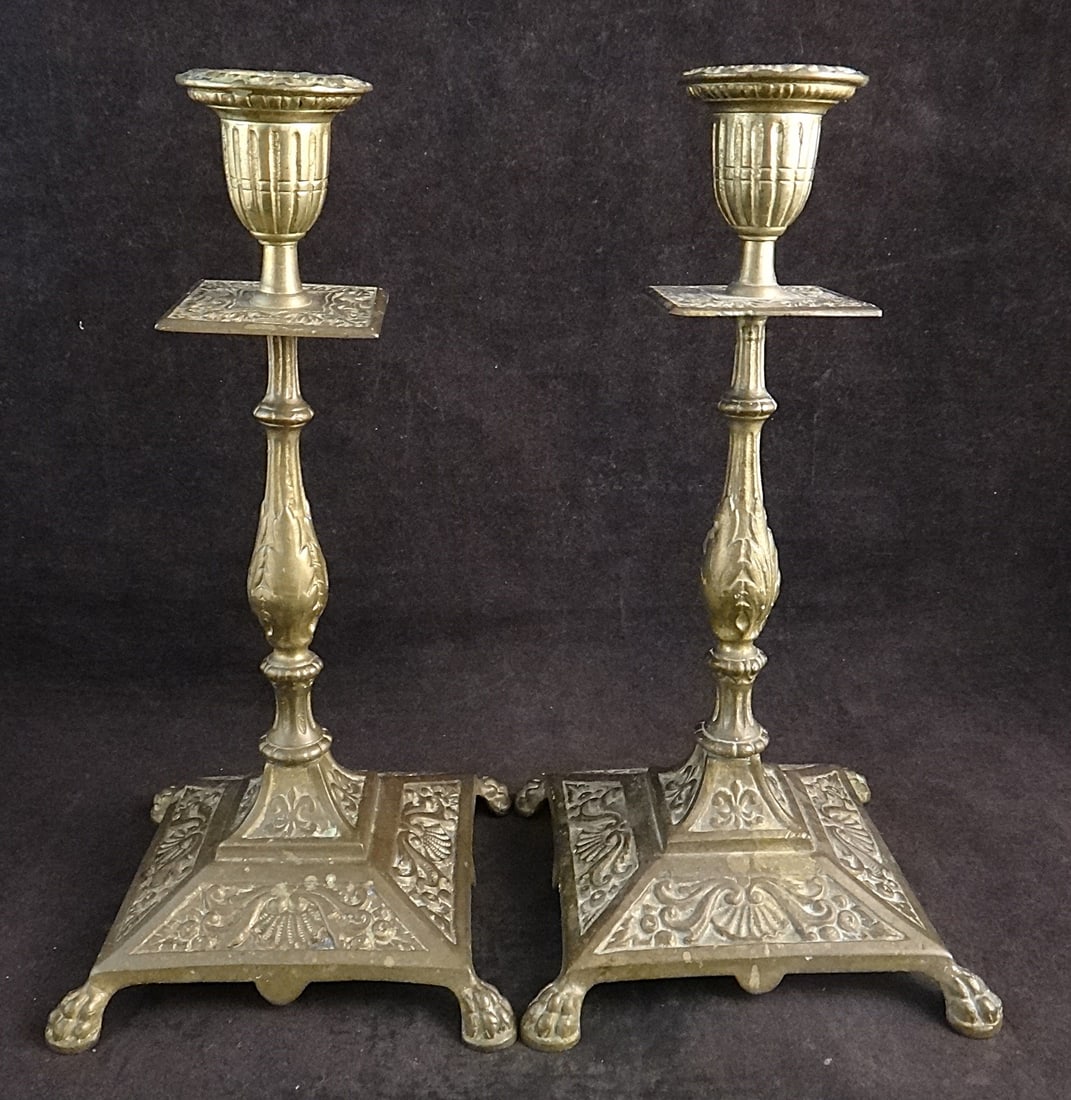 Pr. European Renaissance Revival Gilt Bronze Candlesticks: Pair of European Renaissance Revival Gilt Bronze Candlesticks on Lion Paw Feet with Shell & Floral Motifs – Late 19th cent. Measures 9 ¼” tall, base is 4 ¾” square.