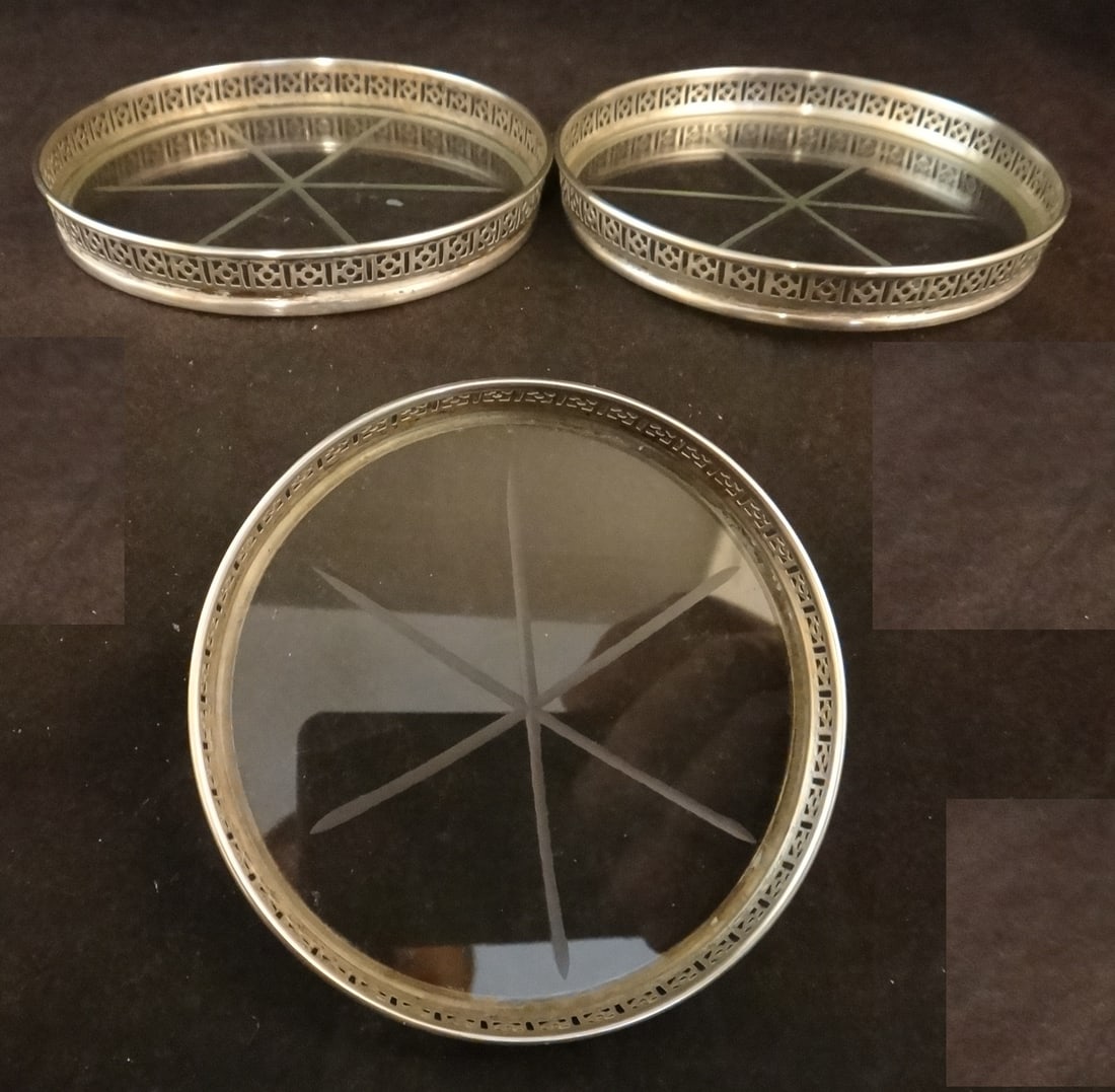 3 Vintage Webster Silver Co. Sterling Coasters w/glass bottoms.: Set of 3 Vintage Webster Silver Co. Sterling Coasters with thin cut glass bottoms. Nicley designed pierced sides. 3 1/8” dia., 92.2 grams total wt.