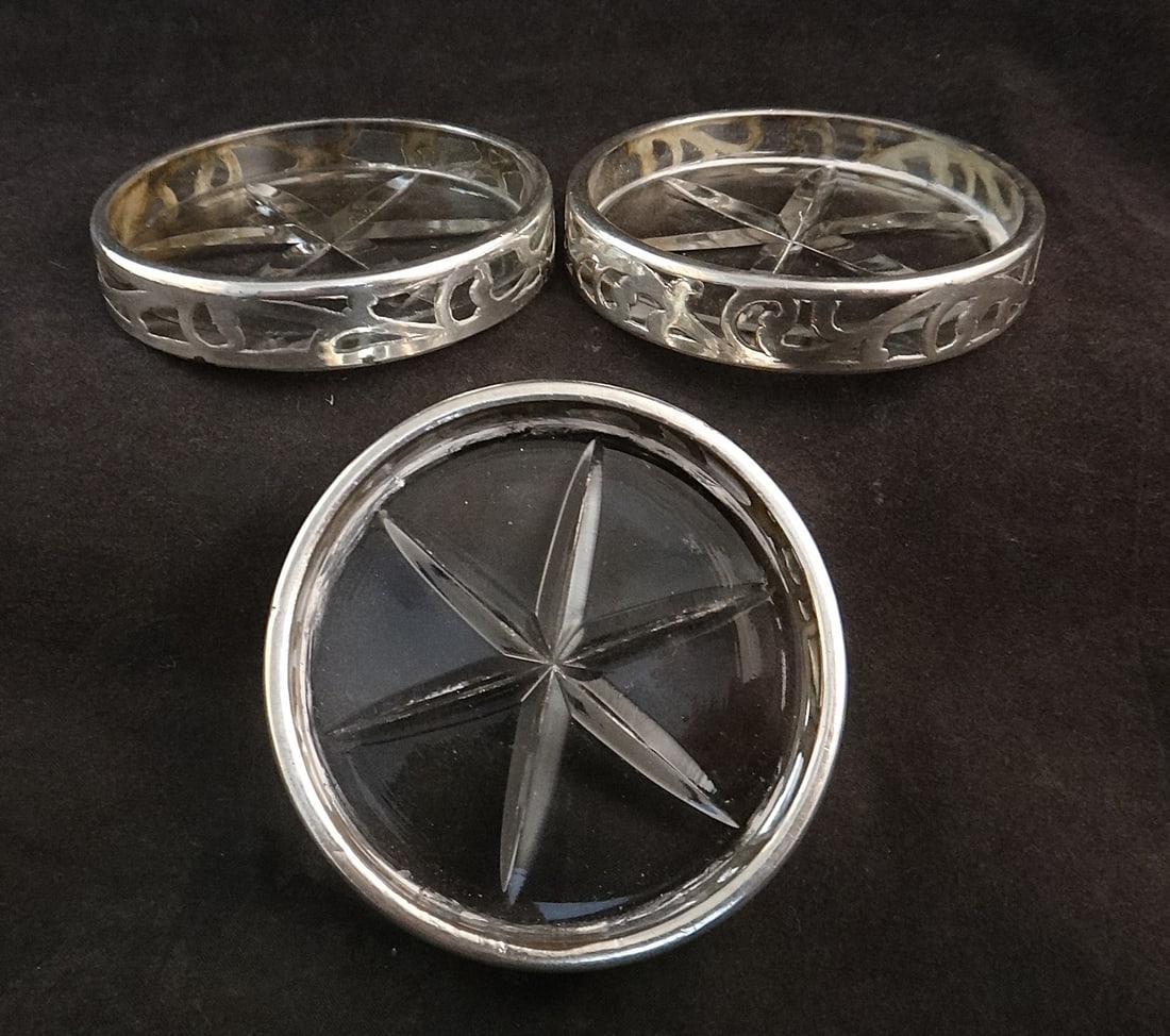 3 mid-cent Heavy Sterling overlay Cut Glass Coasters.: Set of 3 mid-cent Heavy Sterling overlay Cut Glass Coasters. 2 7/8” dia. x ½” tall, 221.6 grams total weight.
