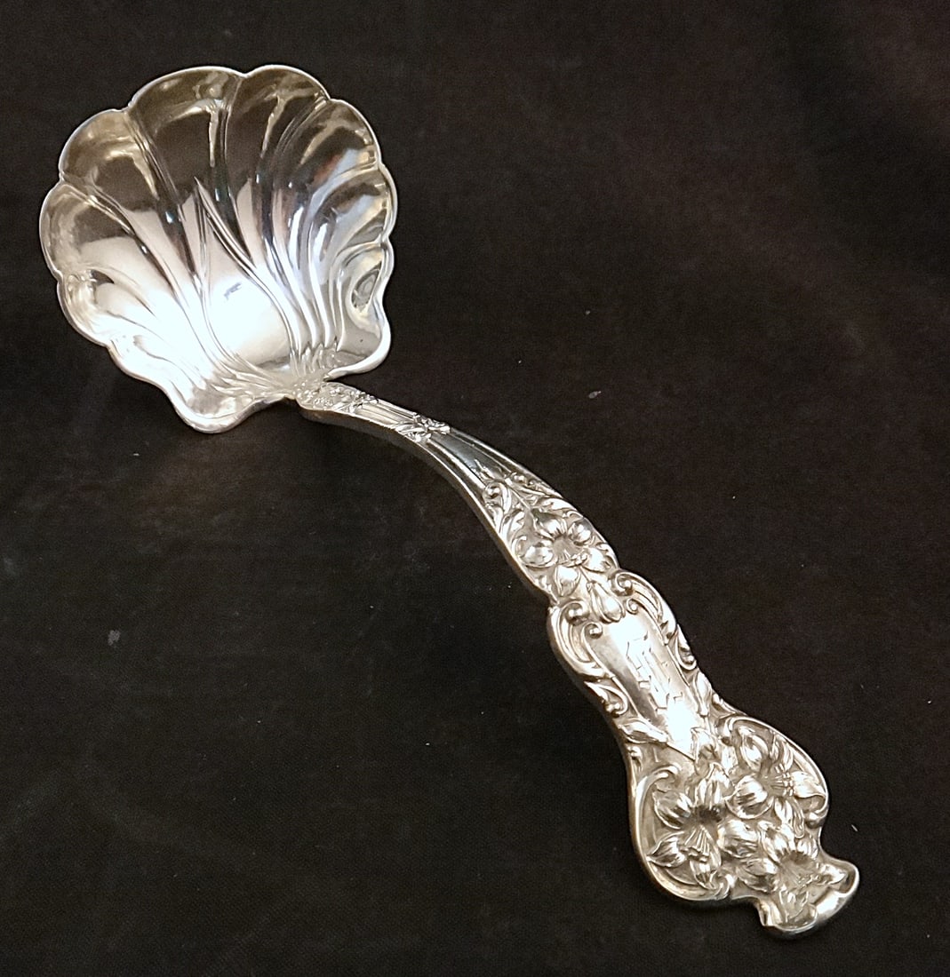1904 Watson Sterling Silver Ladle in the Bridal Flower Pattern: 1904 Watson Sterling Silver Ladle in the Bridal Flower Pattern. 5 7/8” long, 56.8 gr.Hallmarked & Sterling.