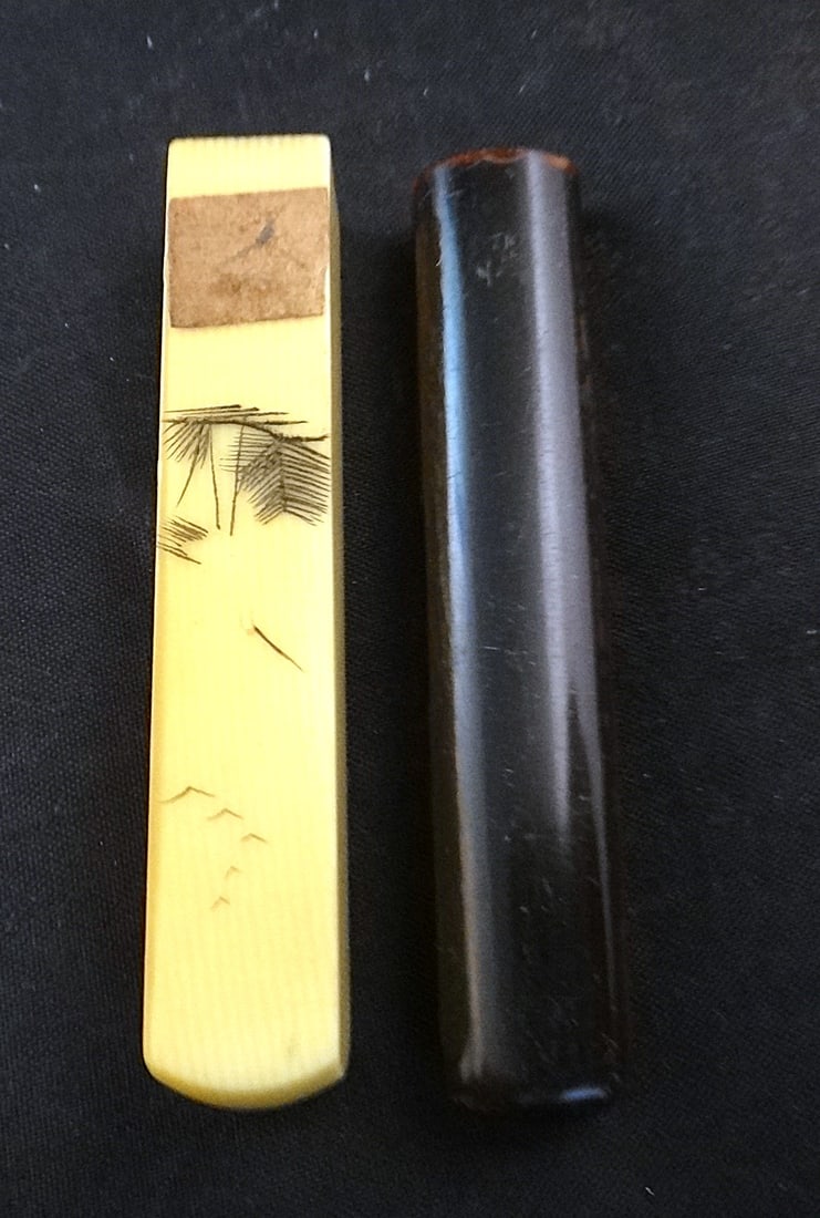 2 Antique Chinese Seals: 2 Antique Chinese Seals. 1. Carved with a scrimshawed Design of a crane amid reeds. The other is carved ox horn. Early 20th cent. Each 2 ½” long.