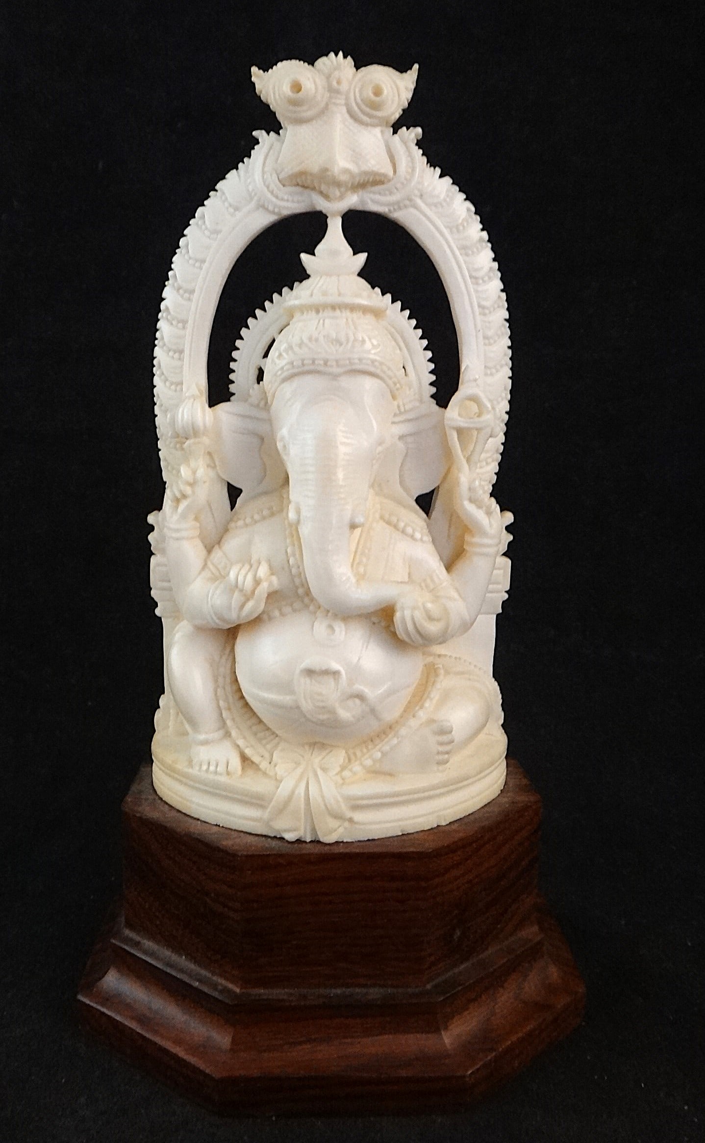 Vintage India Finely Hand Carved Ganesha on Rosewood Base.: Vintage India Finely Hand Carved Ganesha on Rosewood Base. 5 5/8” total height, Deity is 4 ¼” tall x 2 ¼”.