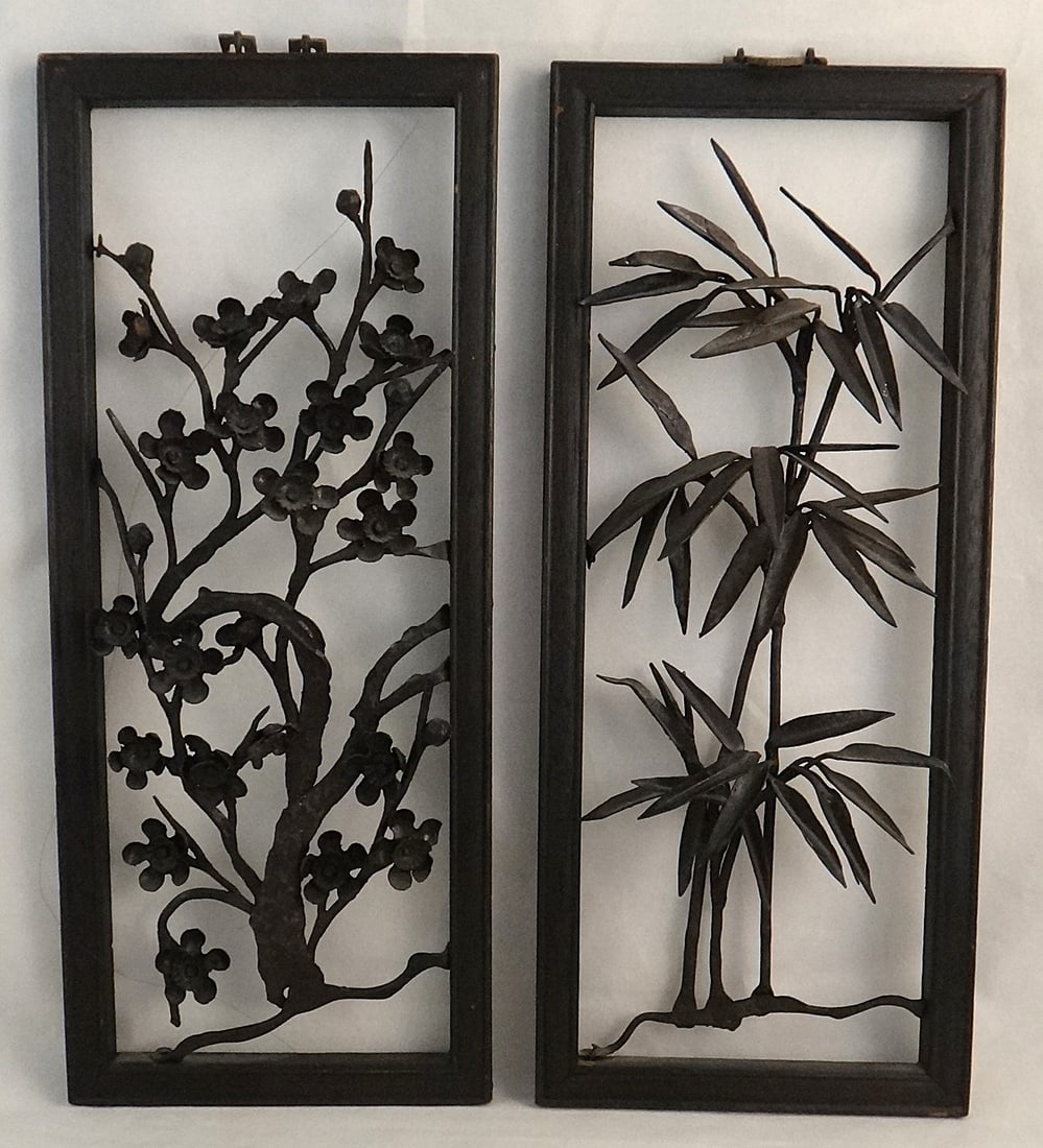 4 Antique Chinese Framed Tooled Iron Panels of different plants: Set of 4 Antique Chinese Tooled Iron Panels of different plants in carved wood frames & brass bales for hanging. Early 20th cent. Frames measure 12” x 4” Iron plants protrude out approx.