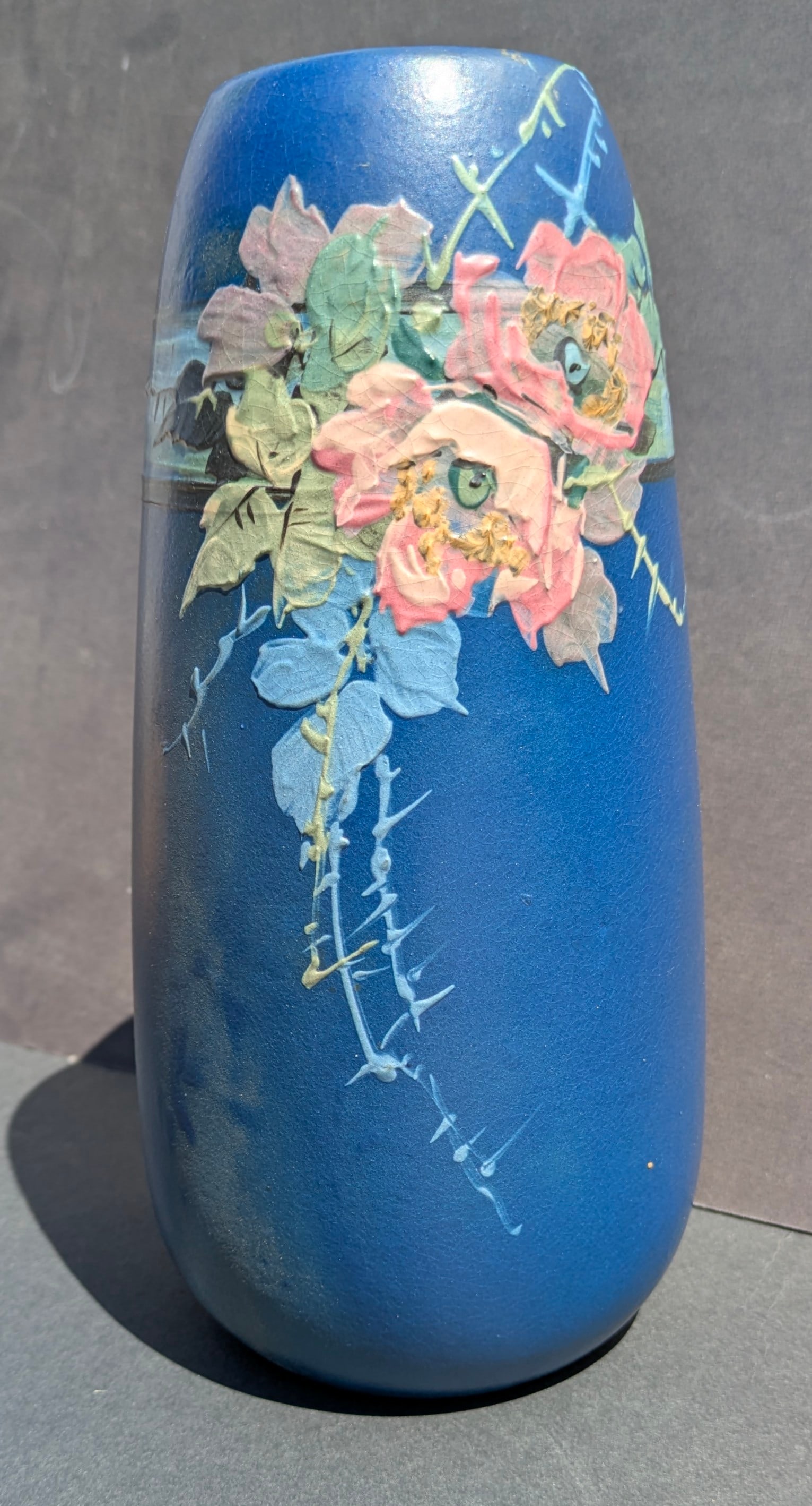Vintage Weller HP Pottery Vase Hudson Blue w/Roses, Leaves & Vines: Weller Hand Painted Pottery Vase with Roses, Leaves & Vines. Hudson blue background. Circa 1920's. 9 ¼” tall x 4 ¼” dia.