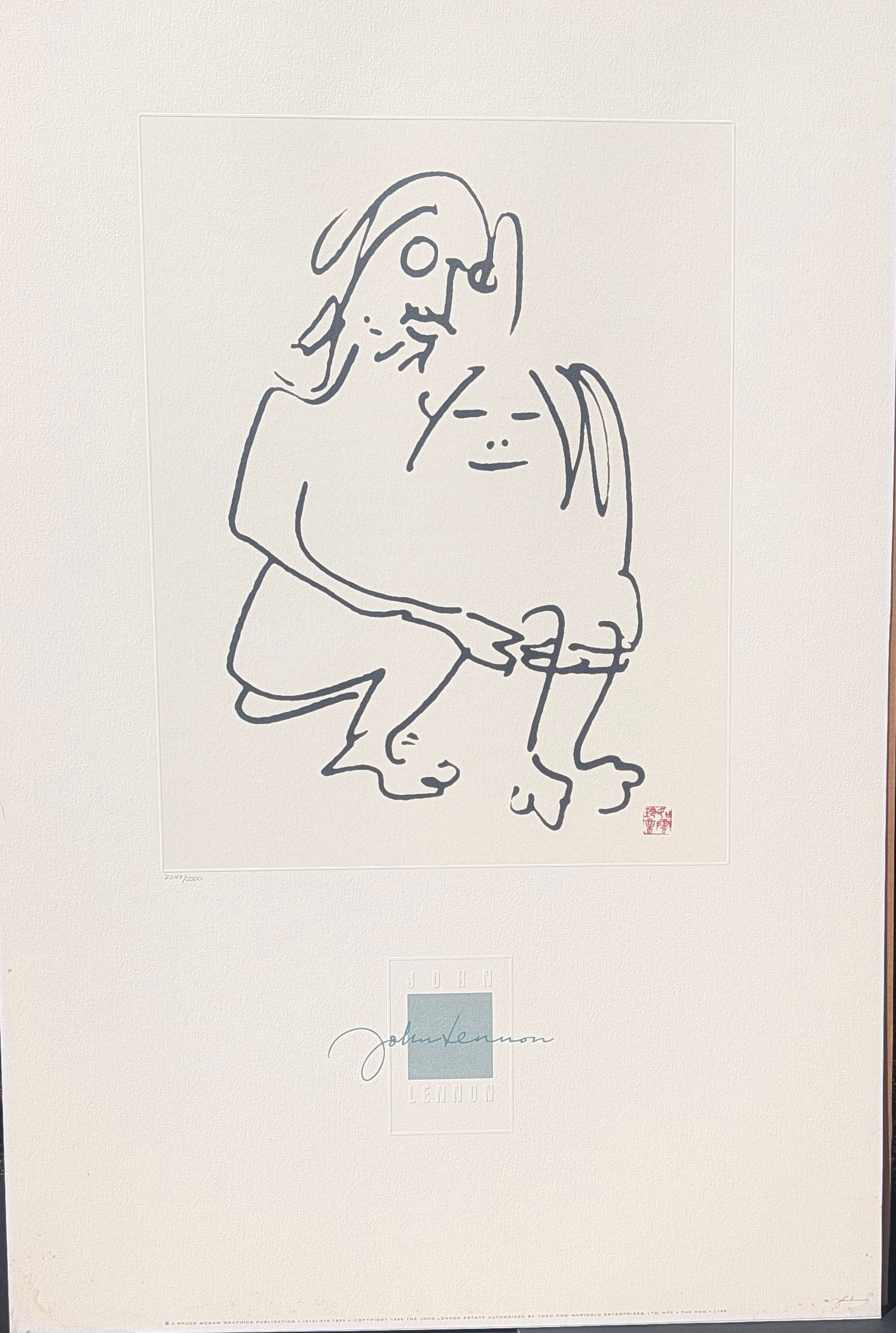 1988 John Lennon L. E. Lithograph "The Hug" with Naked John & Yoko.: 1988 John Lennon (1940-1980) L. E. Lithograph "The Hug" with Naked John & Yoko. Yoko red seal lower right. #2347/5000 in pencil. John Lennon signature in print with embossing. Published by Bruce McGra