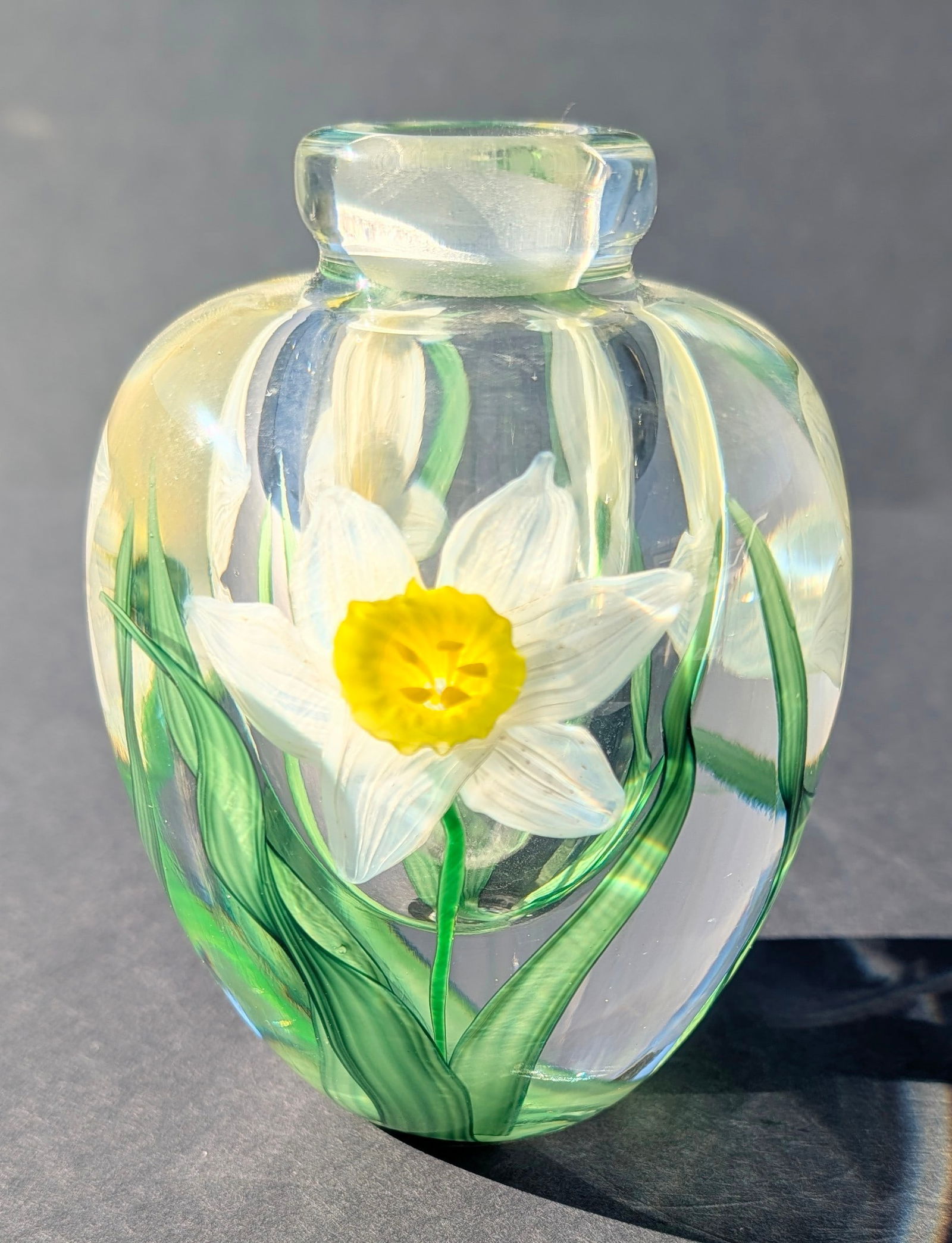 Scarce Steven Lundberg Blown Glass Paperweight Vase: Scarce Steven Lundberg Blown Glass Paperweight Vase with three Daffodils, signed and dated 1997. 5" tall x 3 1/2" diameter.