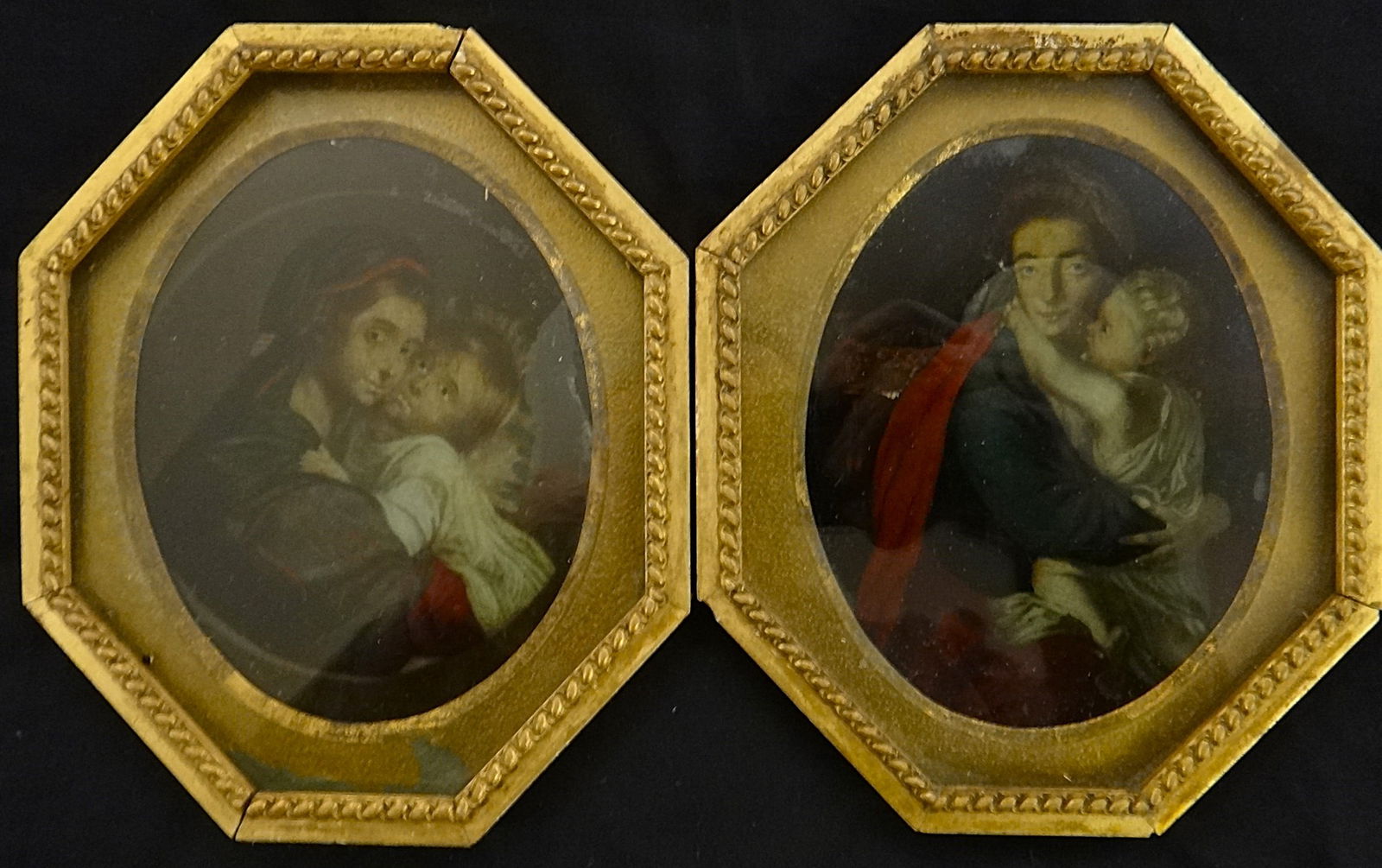 Pr. 18th c. Italian reverse Oil Paintings on Glass of Mothers & their Child: Pair of 18th cent. Italian reverse Oil Paintings on Glass of Mothers & their Child. In antique gold-leafed wood frames. Measure 6 ¾” x 5 ¾”.