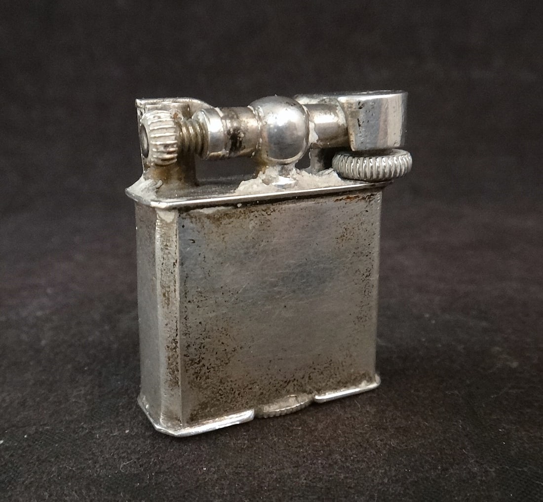 Mid-cent Mexico Sterling Lift-arm Lighter. (1 of 4)