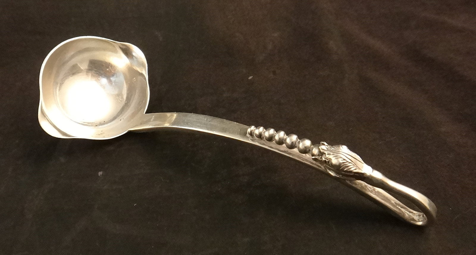 Sanborn mid-c Sterling Mexico Ladle in the Blossom Pattern.: Sanborn mid-cent Sterling Ladle in the Blossom Pattern. Made in Mexico. 6” long, 58.5 grams.