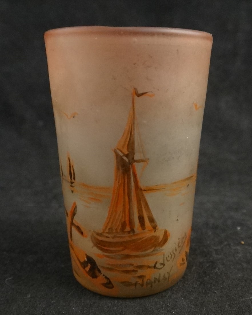 Antique French Nancy HP Enameled-Signed Glass Shot Glass: Antique French Nancy Hand Painted Enameled Glass Shot Glass with a scene of sailboats in a bay with rocks & a tree on shore. Artist signed – Nancy Glossiere in enamel. Circa early 20th cent. 2&rdquo