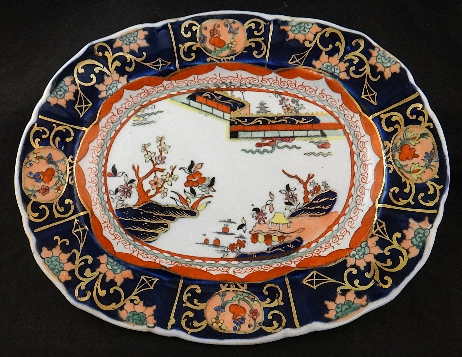 1830’s English Mason’s Ironstone China Serving Dish: 1830’s English Mason’s Ironstone China Serving Dish with floral & symbolic designs. 10 ¾” x 8 ½” x 1 3/8” tall. Mason mark on back.