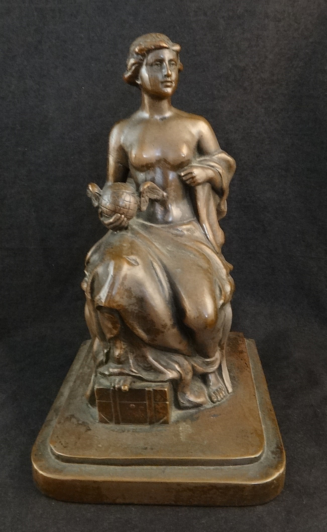 Jenning Brothers Hollow Cast Seated Female Figure - Carl Vieth: Jenning Brothers Hollow Cast Seated Nude Female Figure by artist Carl Vieth holding a Winged Earth. 8” tall, base is 5” x 4 5/8”. Marked on back: JB 1533 & C. Vieth.