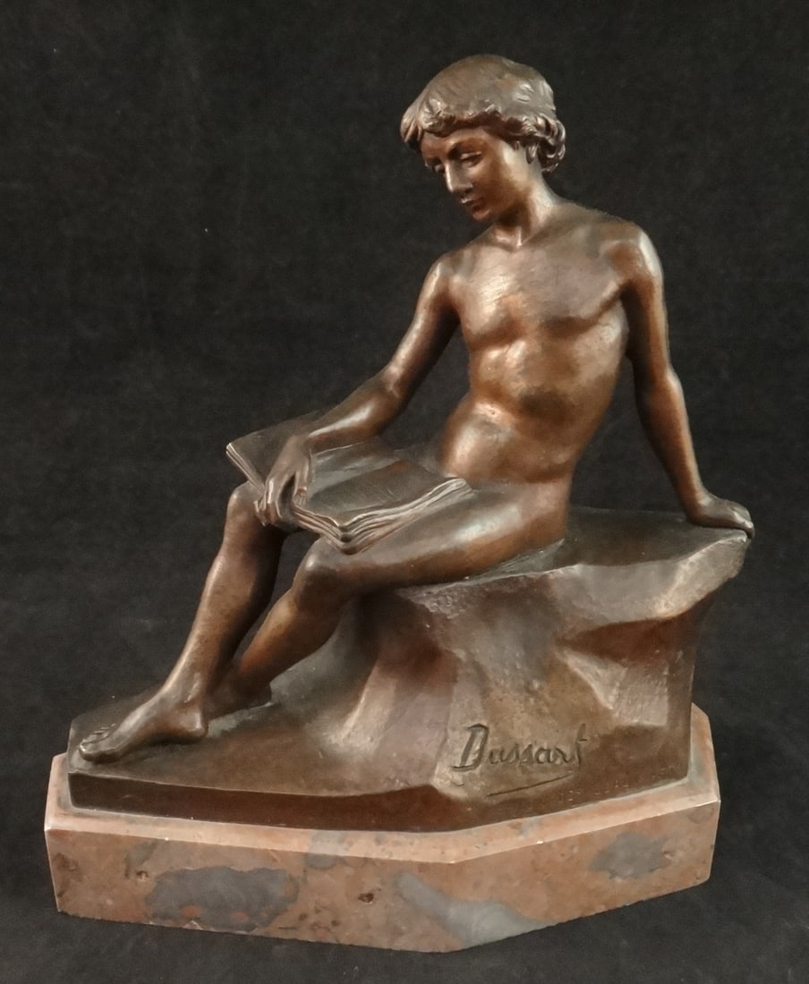 Gustave Dussart Art Deco Bronze, Young Man Reading: Gustave Dussart (1875-1952) Art Deco Bronze Nude Young Man Reading. 2nd Qtr. 20th cent. Attached to a marble base. Signed “Dussart” front bottom. Bronze measures 6” wide x 6 ¼&rdq