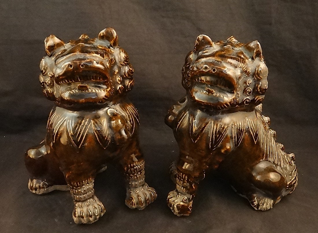 Pr. Antique Chinese Deep Brown Glazed Pottery Foo Lions: Pair of Antique Chinese Deep Brown Glazed Pottery Foo Lions, Late 19th/early 20th cent. 7” x 7 ¼” tall.