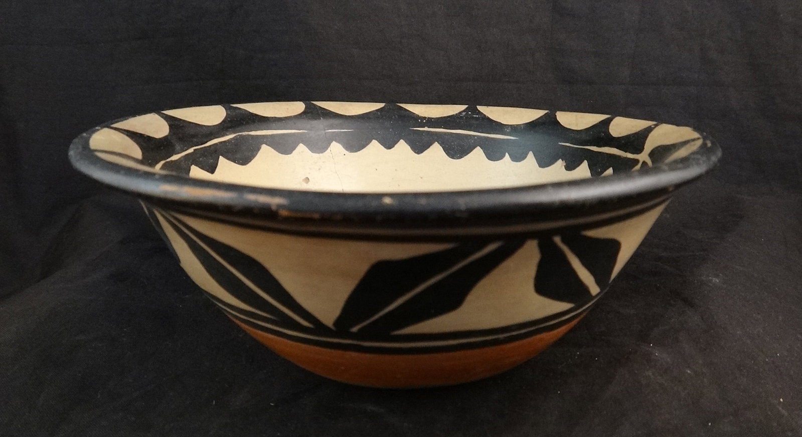 Vtg. Santo Domingo Painted Pottery Bowl: Vintage Santo Domingo Painted Pottery Bowl in black & white with a red rag wiped band below the outside decoration. Early to mid 20th cent. Kewa Pueblo. 6 3/8” dia. x 2 ½” tall.