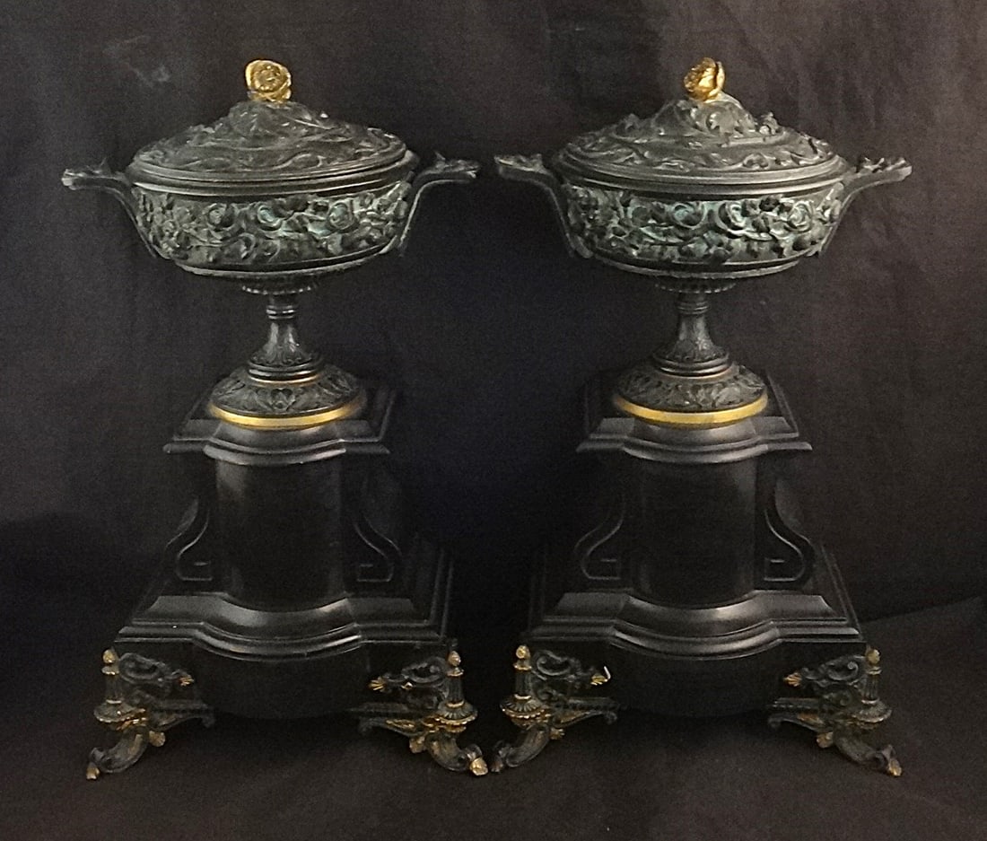 Pr. 19th c. French Grand Tour Patinaed Bronze & Black Onyx Covered Urns: Pr. of 19th c. French Grand Tour Patinaed Bronze & Black Onyx Covered Urns on Scroll & Shell Feet. 23k gold trim highlights. Measure approx. 13 1/8” tall (w/lid), 7 ½” wide x 4 &fra
