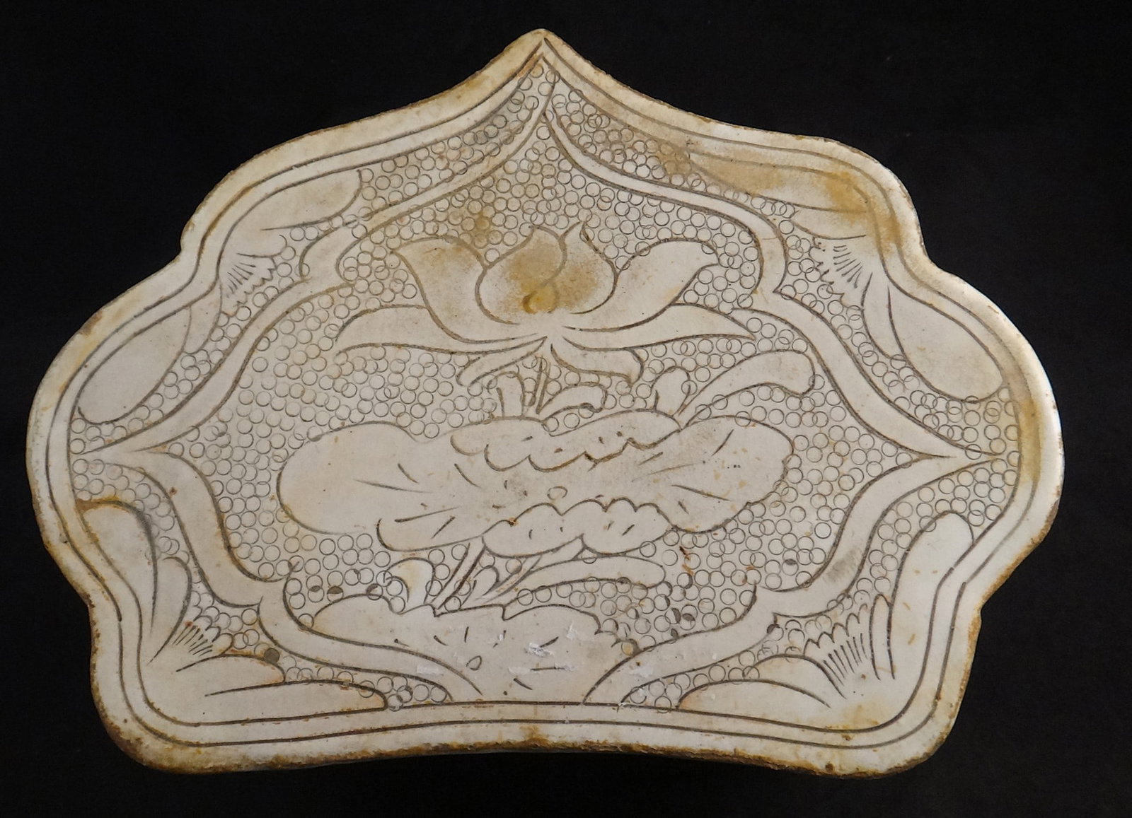 Antique Chinese Northern Song Dyn Lizhou Ceramic Pillow: Antique Chinese Northern Song Dynasty Lizhou Ceramic Pillow. Features white slip & etched decoration of lotus flower & leaves. Circa late 11th-early12th cent. 9 ½” wide x 7 1/2” dee