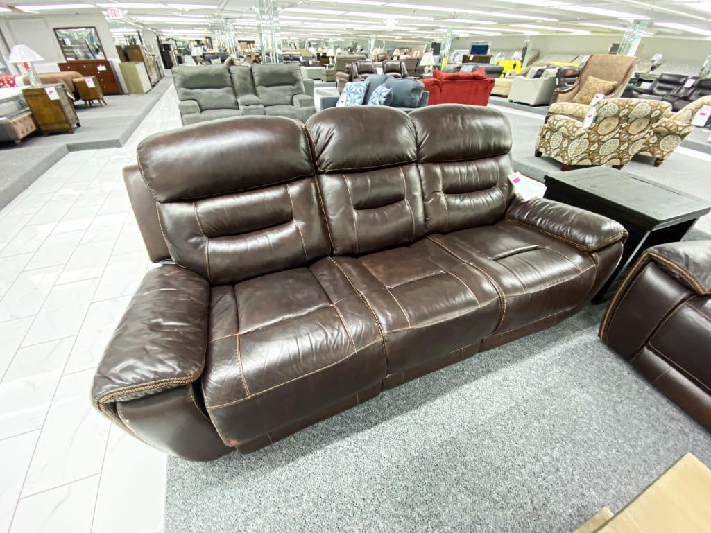 Dark brown sofa, with electronic recliners: *Financing available https://www.supernovafurniture.com/Contents/Site/AUCTION/AUCTION/491