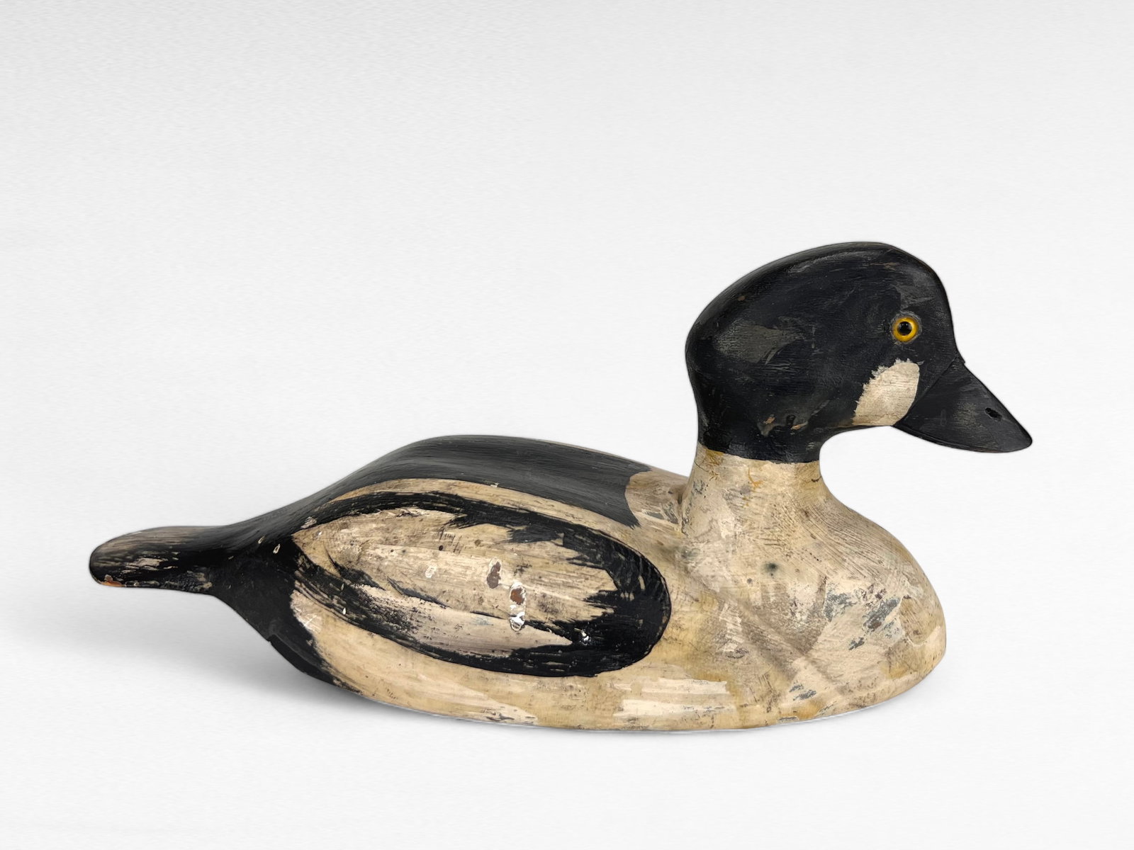 Goldeneye Drake - Addie Nichol: James Adam "Addie" Nichol (1864-1929) - Smith Falls, ON c.1910 -14.5" long - Pronounced goldeneye drake with large hips and a large tufted head. Exact lot Guyette & Deeter July 2014 lot 303. - Conditi