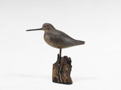 Early Curlew - David Ward: David B. Ward (1947-2020) - Essex, CT c.1977 - 9" tall- Representative of Davids earlier works, this plump and folky Curlew bears an as aged by the maker surface and carved wing details. Comes with