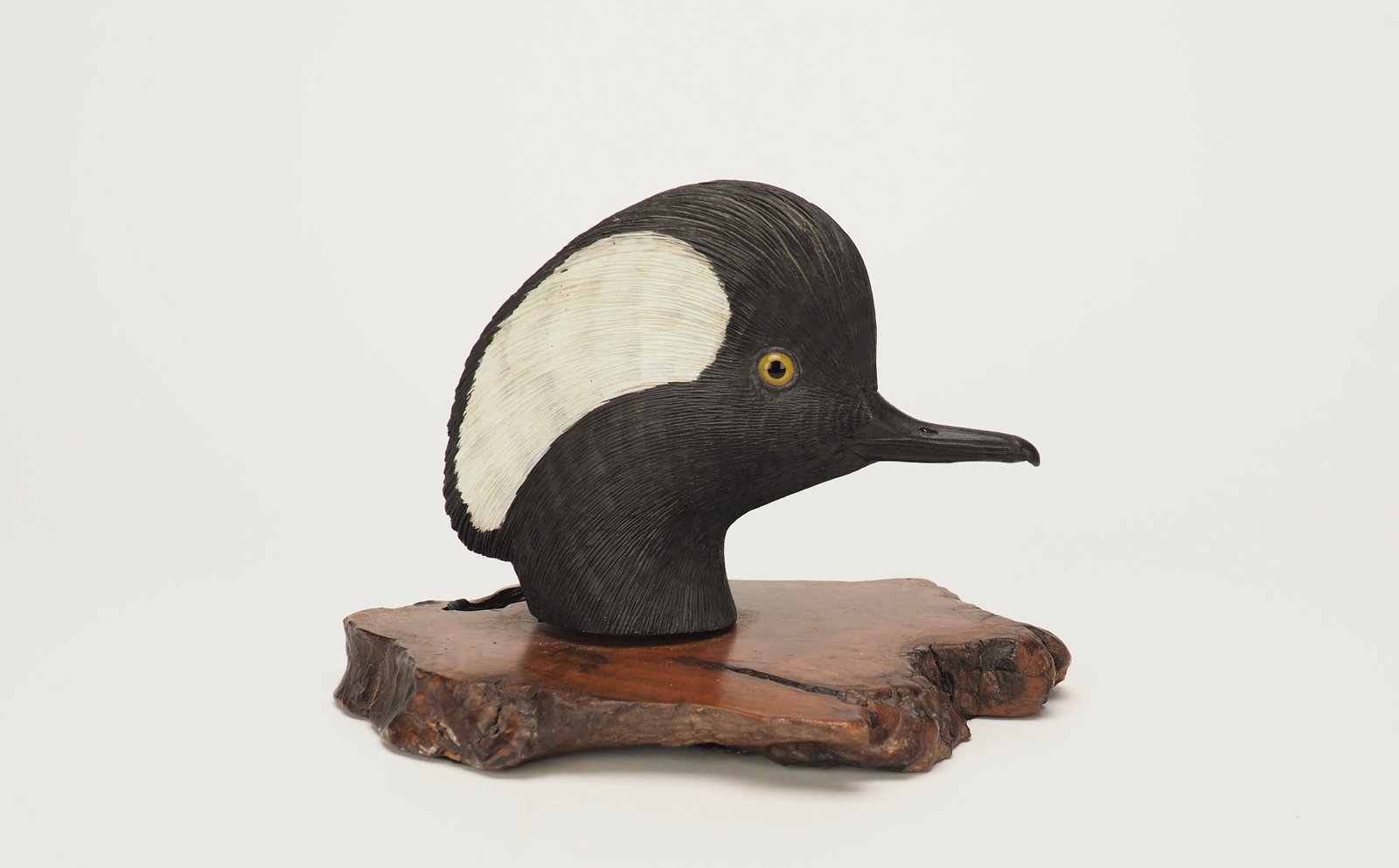 Intricately Carved Hooded Merganser Bust: Ornately carved bust measuring 5" tall
