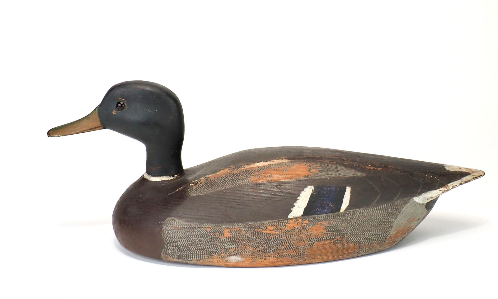 Billy Ellis - Magnum Mallard Drake: Billy Ellis (1865-1963) Whitby, Ontario, Canada 19" long Elongated body with an alert head and thin neck gently turned off to the left. Large glass eyes with carved bill details including deep carving