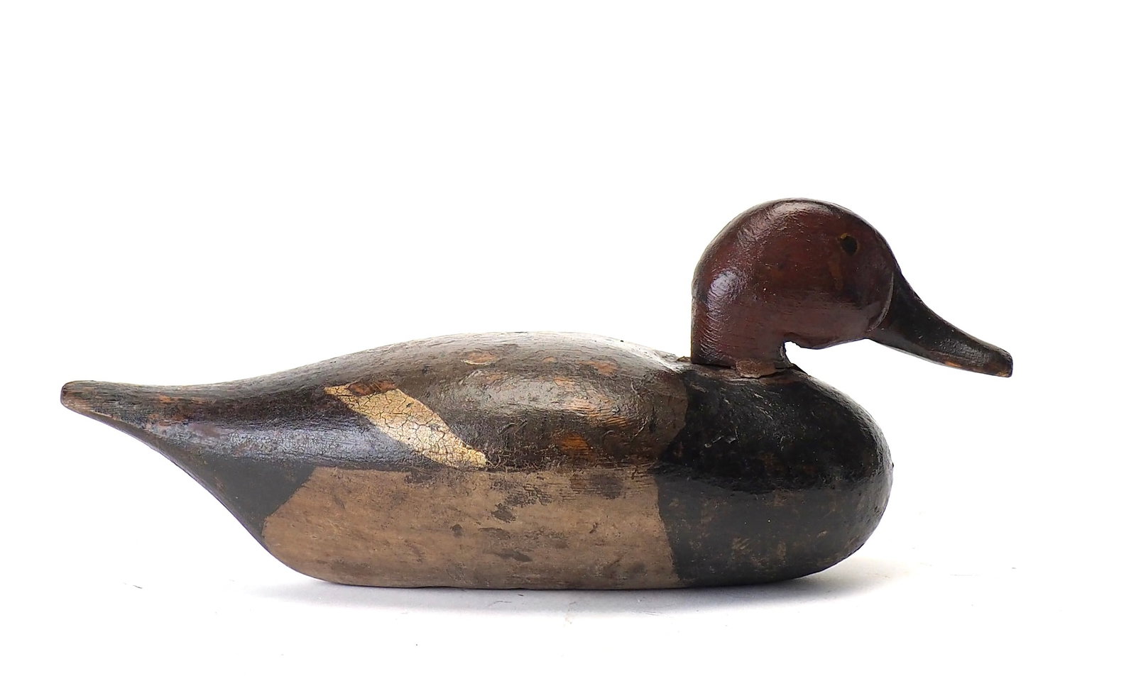 Petersen Decoy Factory - Redhead Drake: Petersen Decoy Factory (1872-1883) Detroit, MI, c. 1870's 14.5" long Branded "S. Russell" on the bottom with "THB Roer. NY" as well. A rigmate to lot 206