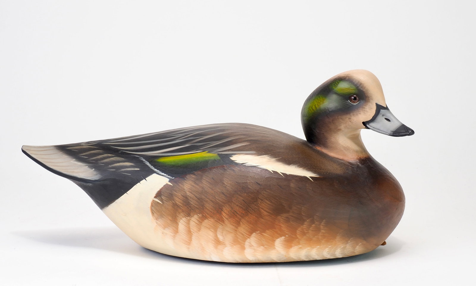 Sean Sutton - Widgeon Drake: Sean Sutton (b. 1967) Paulsboro, NJ 15" Bold smooth body hollow carved decoy. Well sculpted with a rasped turned head Sean Sutton stamped lead pad weight. Condition: Excellent and original