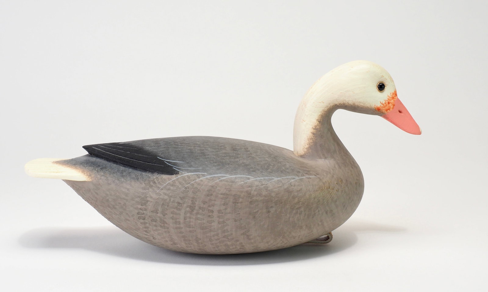 Rick Brown - Miniature Emperor Goose: Frederick "Rick" Brown Point Pleasant, NJ, 2001 8.75" Signed and dated 2001. Hollow carved with carved tail feathers and incised raised 'V' tip feathers. Condition: Very good and original with sap