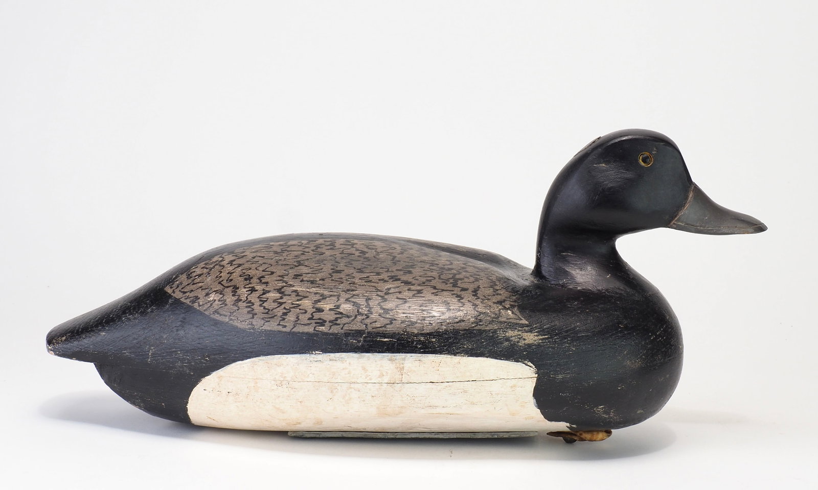 Clark Madera - Bluebill Drake: Clark Madera (1883-1953) Pitman, NJ 14.5" long Hollow carved with bold sculpted shoulders and deep carving where the face meets the bill. Condition: Very good and original with even light wear from