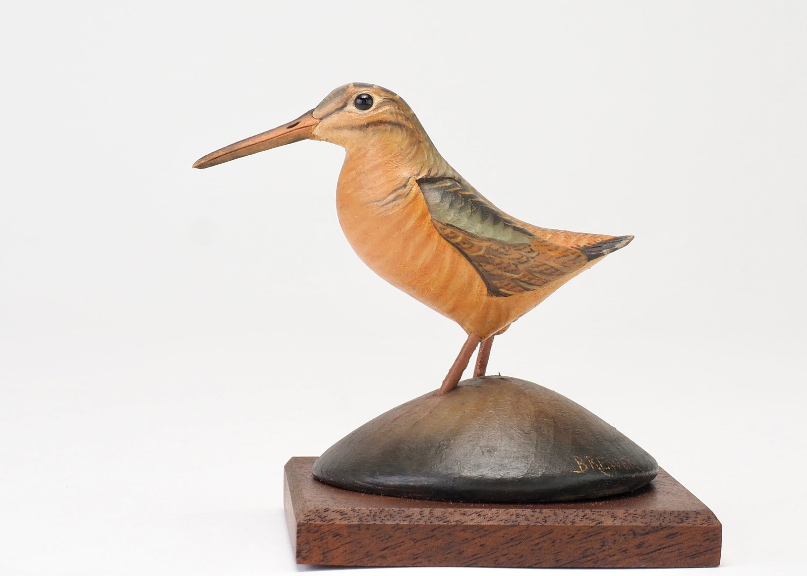 Josh Brewer - Miniature Woodcock: Josh Brewer (b. 1983) Little Deer Isle, ME 3.75" tall Vibrant and very well carved miniature wood cock on a carved base. Glass eyes with pronounced beak carving details. Wings are carved into the shou