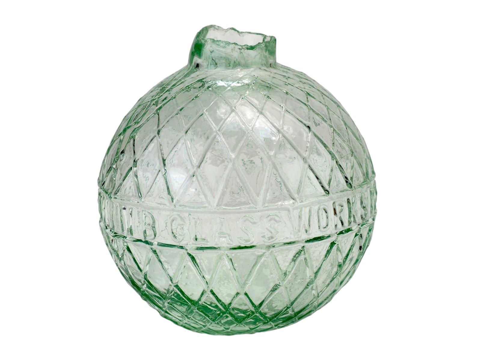 NB Glassworks Perth - Green Glass Target Ball: North British Glassworks Perth, Scotland Two piece construction. 2 5/8th diameter with NB Glassworks Perth on the two halves. Provenance: Mike Fortney Collection