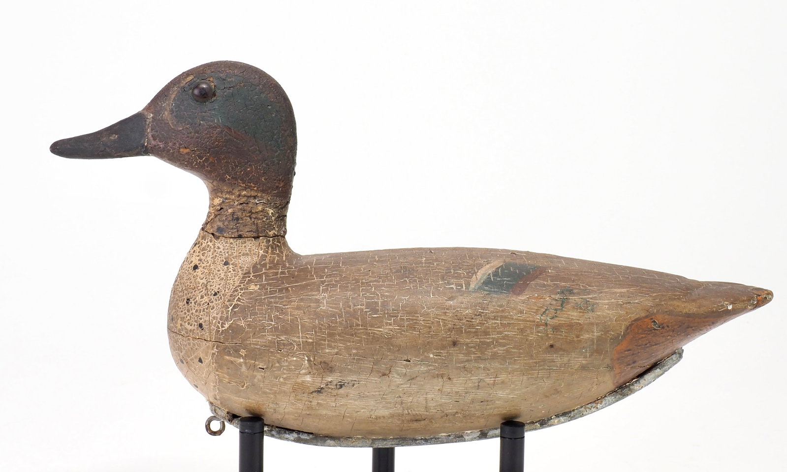 Otton Garren - Green Wing Teal Drake: Otto Garren (1890-1968) Canton, IL 11" long Hollow carved with an alert head. Glass eyes and relief carving where the face meets the bill. Condition: Thick working paint with small tail chip and neck