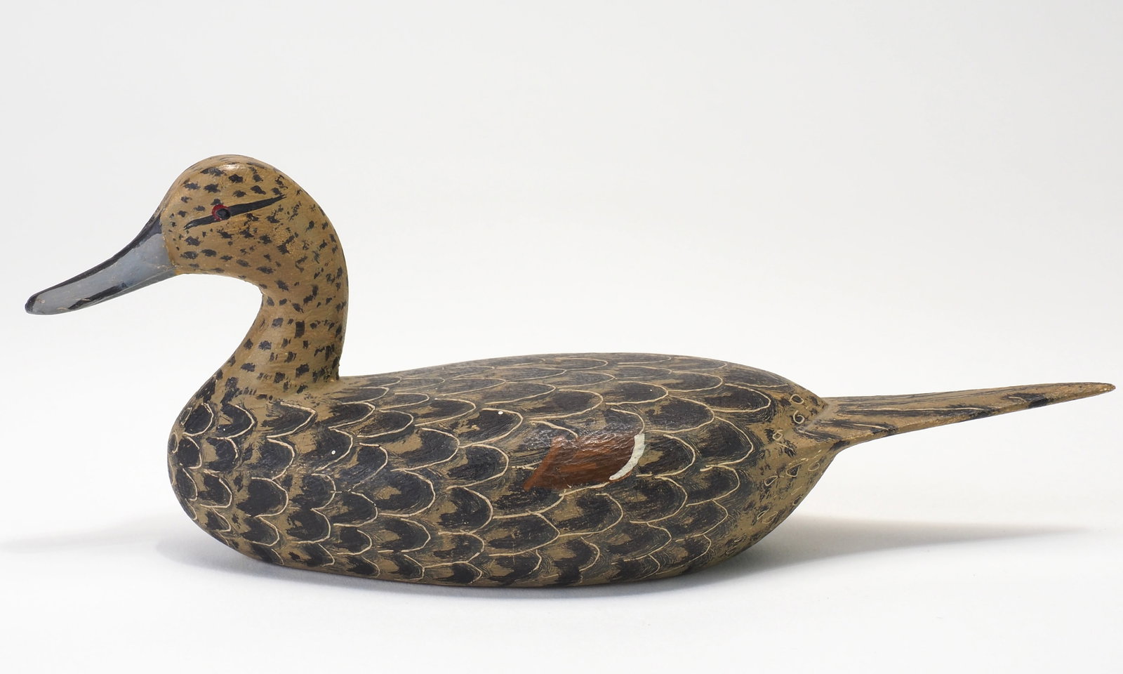 Artie Bennett - 7.25" Miniature Pintail Hen: Artie Bennet (Arthur Behmetuik) Lockport, IL, 1960 7.25" long Unusually large size with vibrant paint and scratch feathering on the surface. Head is slightly turned. Signed and dated June