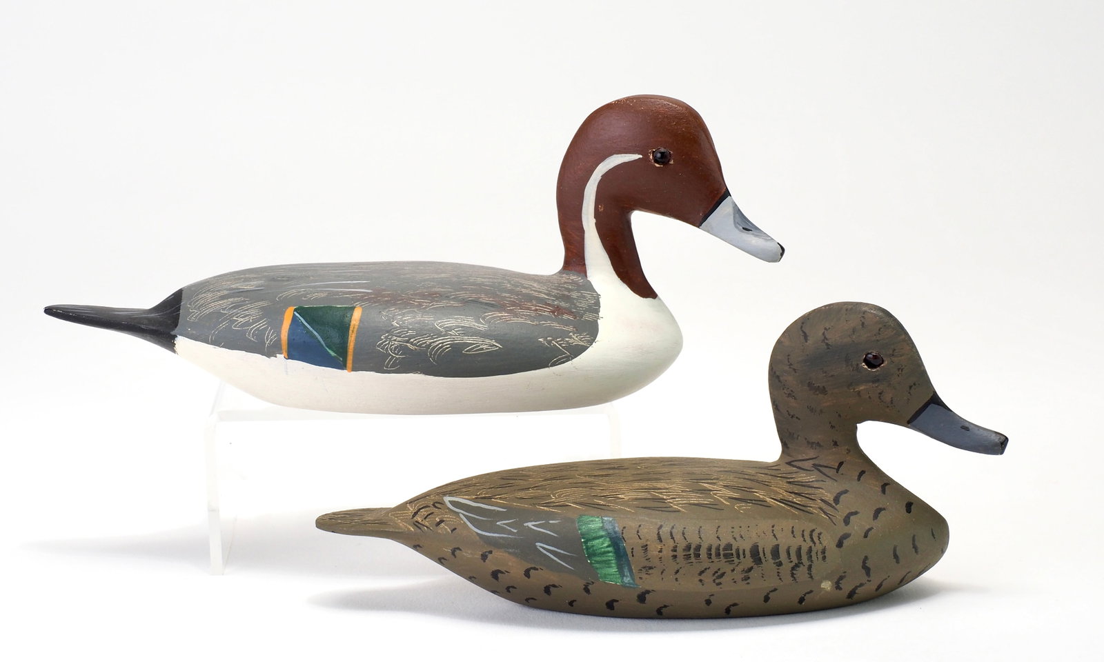 Wilfred Bush - Miniature Pintail Pair: Wilfred J. Bush (1920-1999) Pekin, IL 5.25" and 6" Small glass eyes with turned head and scratch feather paint. Signed and dated 1993 and 1994 Condition: Excellent and original Provenance: Dennis Fort