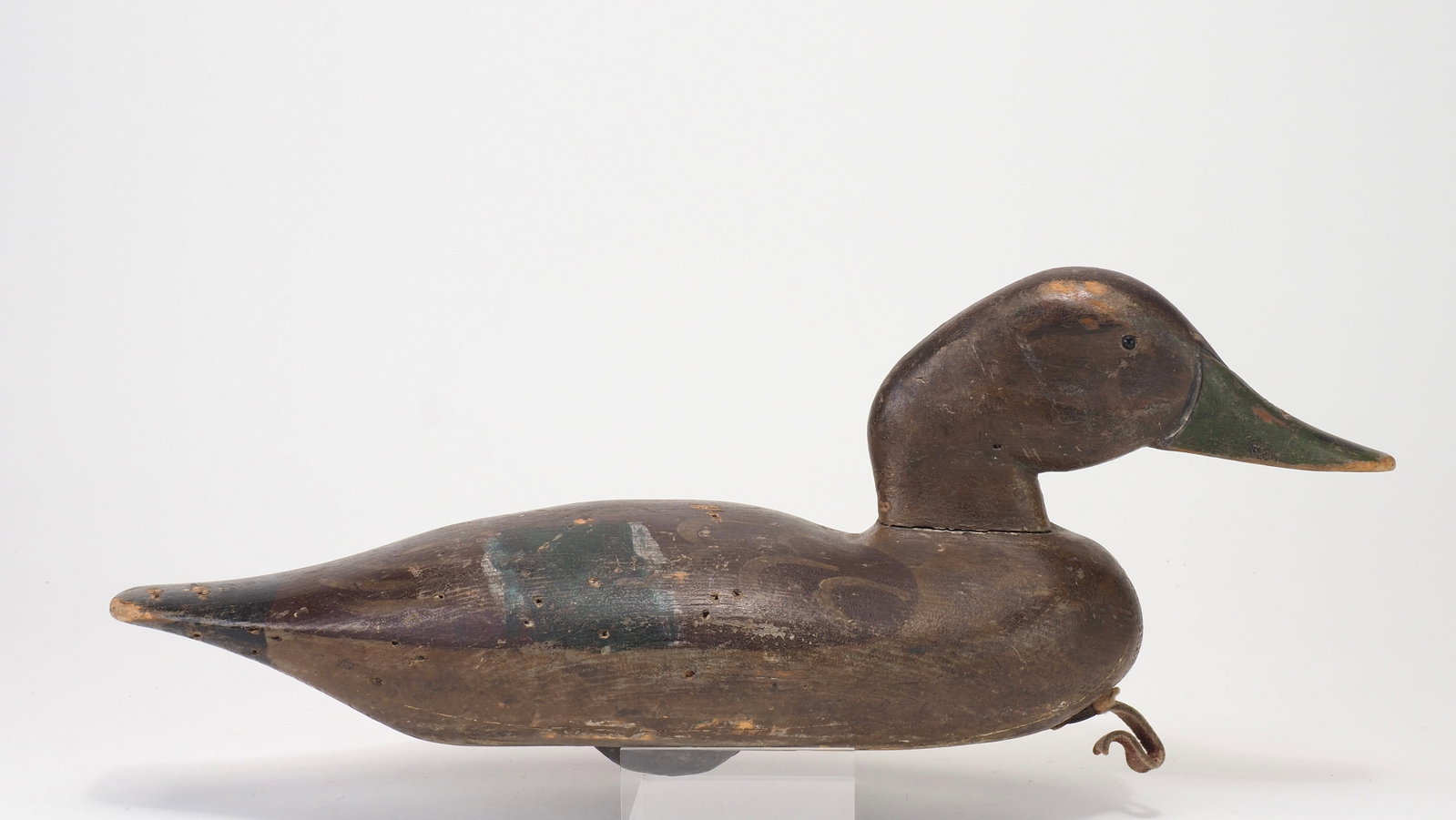Dodge Decoy Factory - Mallard Hen: J. N. Dodge Decoy Factory (1883-1893) Detroit, MI 16.5" long Small glass eyes with relief carving where bill and face meet Condition: Entirely original with shot scars across body and paint loss to