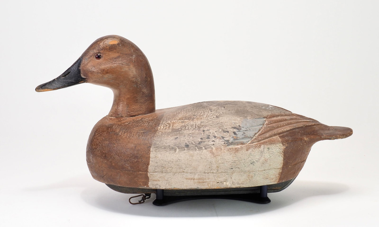 Ben Schmidt - Hollow Canvasback Hen: Benjamin S. Schmidt (1884-1968) Centerline, MI 15.75" long Hollow carved decoy with a thick bottom board and the original keel. Relief carved wing tips on the back with light stamping in front of the 
