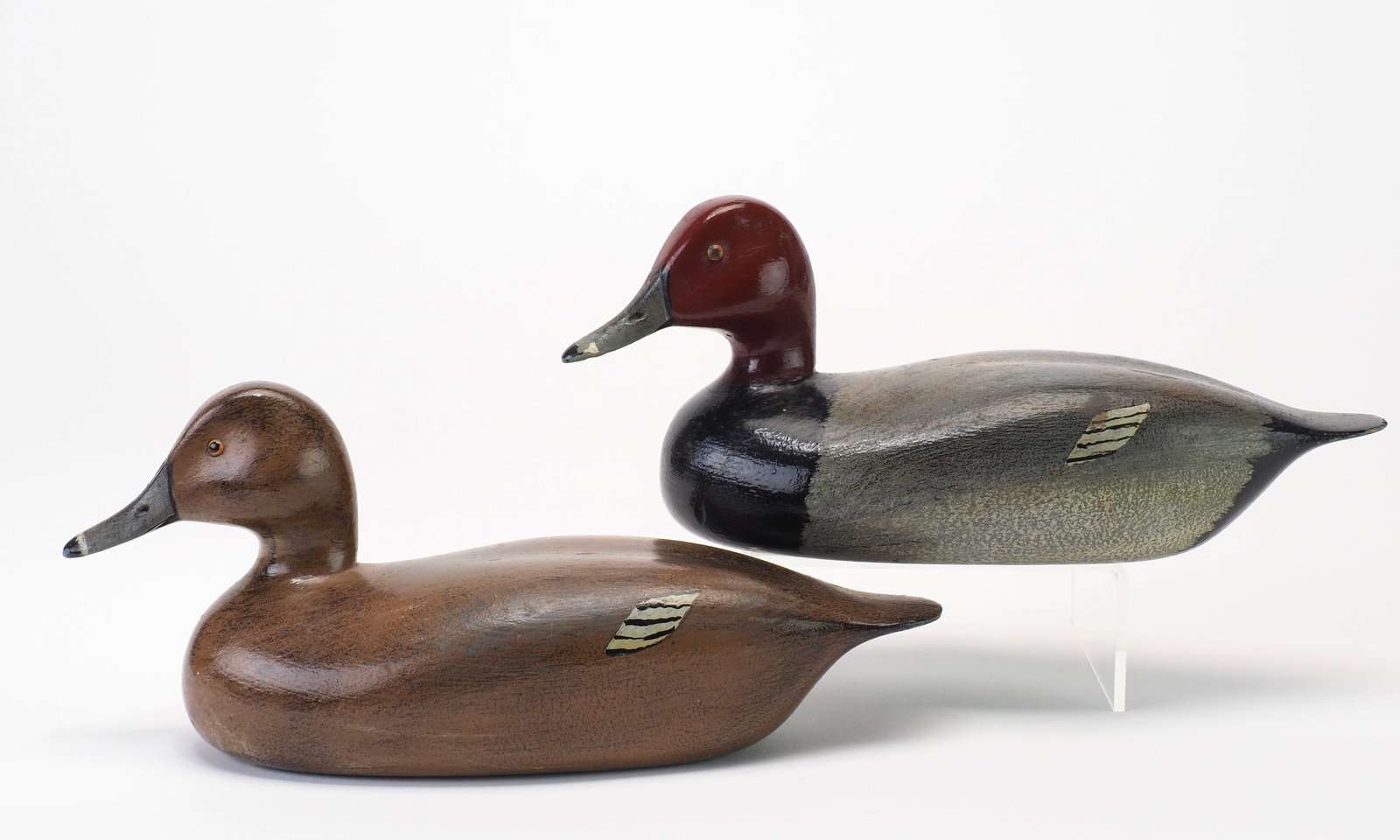 Menin "Min" Brabaw - 1/4 size Redhead Pair: Menin Brabaw Algonac, MI 7.25" and 5" A mid 20th century Michigan decoy carver known for traditional hunting decoys as well as half-size and miniature waterfowl. Nicely carved and finished with painte