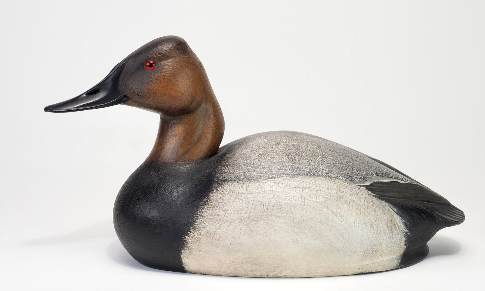 John Zachmann - Competition Canvasback Drake: John Zachmann (1929-2017) Detroit, MI c.1960's 16" long An exceptionally well carved and finished decoy, Zachmann is recognized as one of the Midwest's premier contemporary carvers of his time. Though